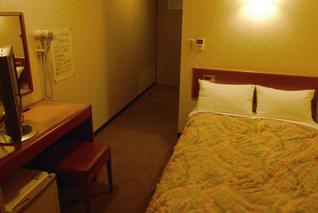 Hotel New Budget Muroran Habitación foto