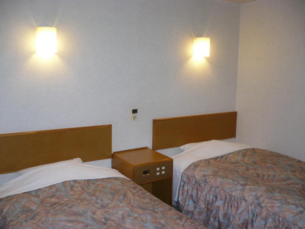 Hotel New Budget Muroran Habitación foto