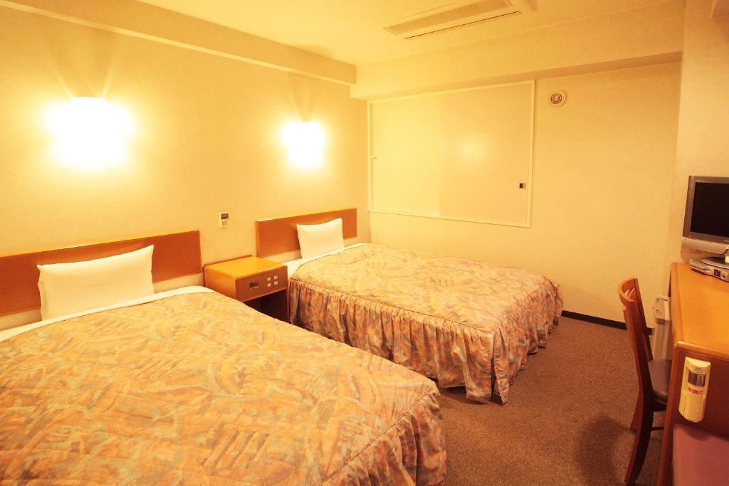 Hotel New Budget Muroran Habitación foto